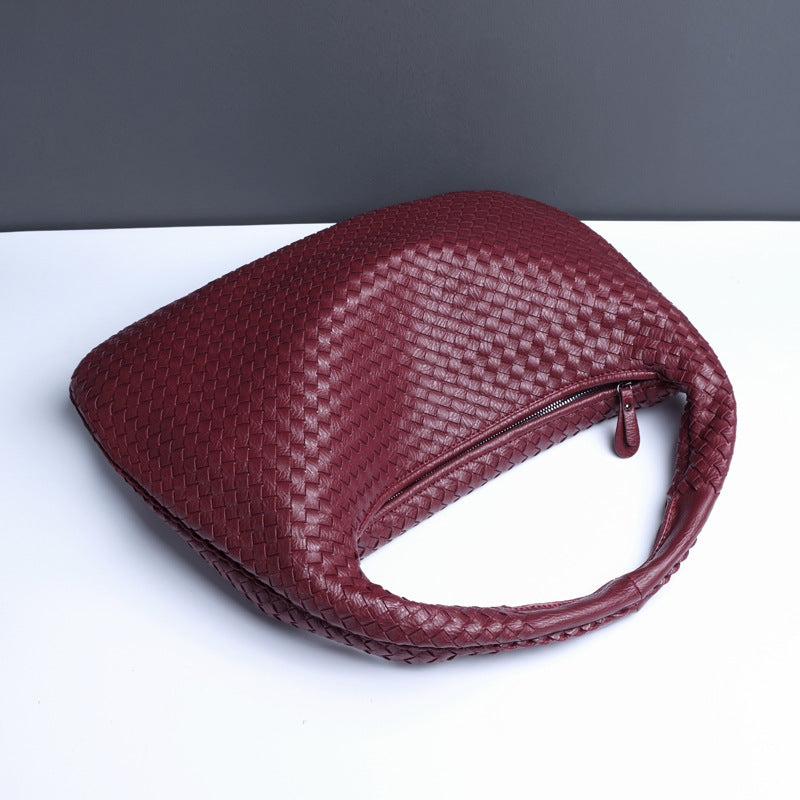Crescent shaped hand woven fashion bag