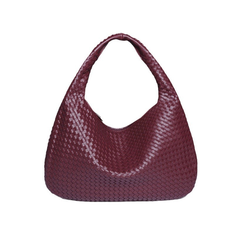 Crescent shaped hand woven fashion bag