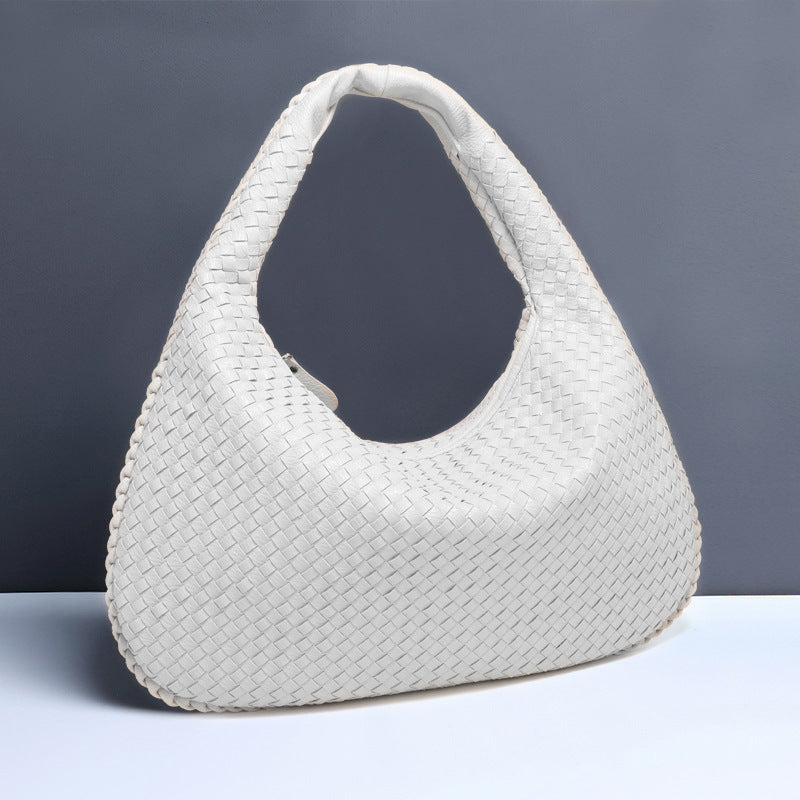 Crescent shaped hand woven fashion bag